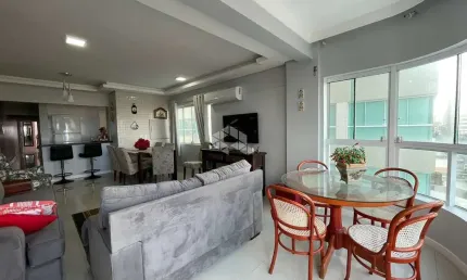 Apartamento mobiliado com 117m² de 03 dormitórios e 02 vagas de garagem em capão da canoa