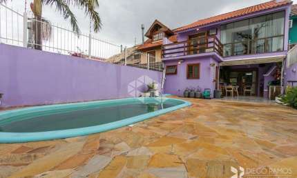 Casa sobrado 3 dormitórios, 2 vagas no bairro Espírito Santo