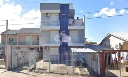 COBERTURA EM CACHOEIRINHA COM VAGA COBERTA ESCRITURADA