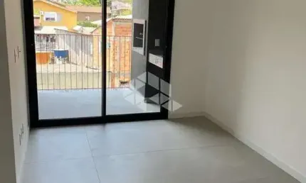 Apartamento de 2 dormitórios  c/ suíte 1 e churrasqueira á carvão  no João Paulo
