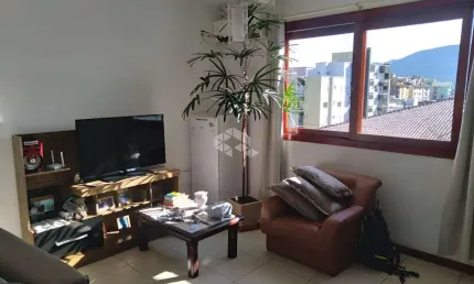 Apartamento de 2 dormitórios com vaga de garagem à venda no bairro Camobi em Santa Maria