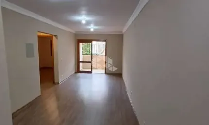 Apartamento térreo, 2 dormitórios, sacada integrada com churrasqueira, 1 vaga de garagem coberta Centro/Canoas