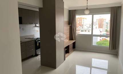 Apartamento com dois dormitórios e vaga de garagem em Porto Alegre.
