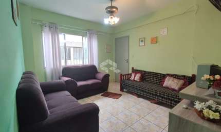 apartamento a venda na praia grande, bairro ocian, com 2 quartos e 1 vaga.