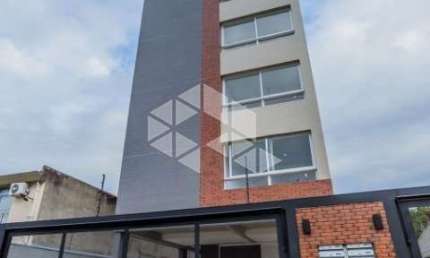 Apartamento 2 dormitórios suíte churrasqueira 2 vagas garagem Novo