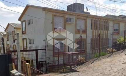 Apartamento 01 dormitório, 3º pavimento, 50m2 totais, 38m2 privativos, com vaga rotativa na Medianeira - Poa/Rs.