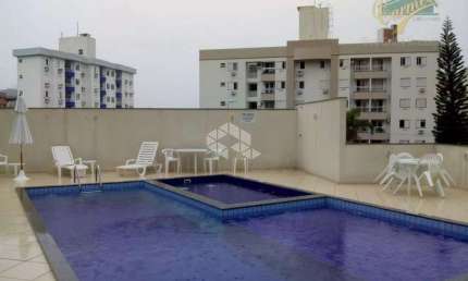 APARTAMENTO COM 2 QUARTOS SENDO 1 SUÍTE E 2 VAGAS DE GARAGEM NO ITACORUBI EM FLORIANÓPOLIS/SC