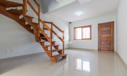 CASA/SOBRADO 3 DORMITÓRIOS, 02 SUÍTES, NO BAIRRO GUARUJÁ EM PORTO ALEGRE
