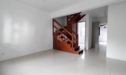 Casa em condomínio fechado, 3 dormitórios sendo 1 suíte americana,com Vaga de Garagem no Bairro Humaita, em Porto Alegre