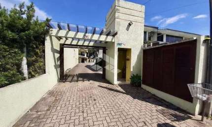 Duplex de 2 quartos e garagem em condominio em Tramandai