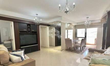APARTAMENTO SEMIMOBILIADO COM 3 QUARTOS SENDO 1 SUÍTE 1 VAGA DE GARAGEM E HOBBY BOX NO BALNEÁRIO EM FLORIANÓPOLIS