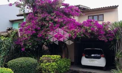Casa 3 dormitórios para venda no bairro Hípica em Porto Alegre/RS
