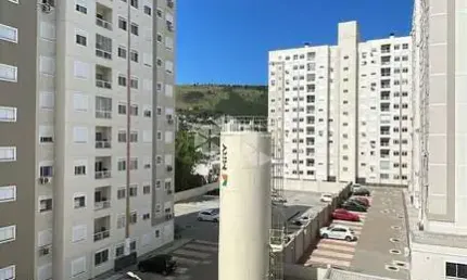 Apartamento novo de 2 quartos, sacada com churrasqueira e vaga no Morro Santana