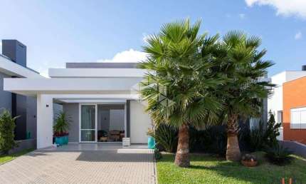 Casa à venda, com 4 quartos/dormitórios, 2 vagas/box, no condomínio Dubai, Capão da Canoa/RS