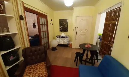 apartamento um dormitório, condomínio com elevador, mobiliado, próximo UFRGS, centro histórico.