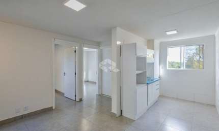 Apartamento reformado, 2 dormitórios, cozinha integrada com sala de estar, estacionamento, quiosque, bairro Santo Afonso, em Novo Hamburgo.