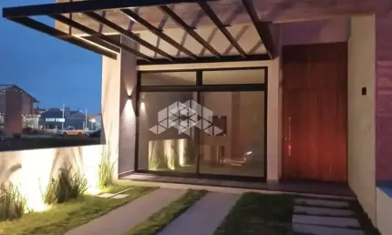 Casa nova em Capão da Canoa com 3 dormitórios (1 suíte) a 2 quadras do mar - Alto padrão e estilo contemporâneo
