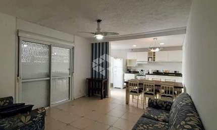 Apartamento 03 dormitórios mobiliado, 01 box na cidade de Capão da Canoa