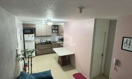 Apartamento com 2 dormitórios, 01 vaga no Bairro Fátima, Canoas