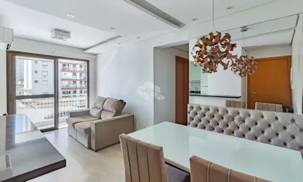 Apartamento de 2 dormitórios com suíte, sacada e churrasqueira, 1 vaga de garagem no bairro Passo da Areia
