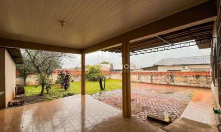 Casa comercial para locação com 1 suíte + 6 quartos, com excelente sobra de terreno, CENTRO - TOLEDO/PR
