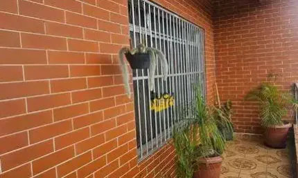 Sobrado com 3 dormitórios à venda, 137 m² por R$ 480.000 - Parque das Américas - Mauá/SP