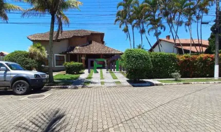 Linda casa condominio 4 dormitorios com piscina em Peruibe.
