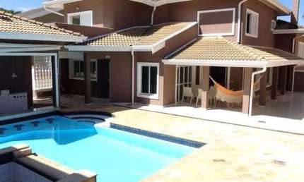 Sobrado com 4 dormitórios para alugar, 580 m² por R$ 17.261,00 - Alphaville - Campinas/SP