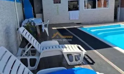 À venda i0255 - casa 3 dormitórios em massaguaçu - caraguatatuba/sp