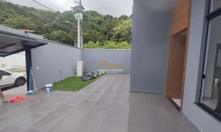 À venda i0506 - casa 3 dormitórios com piscina no massaguaçu em caraguatatuba/sp