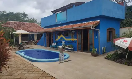 À venda i0895 - casa 3 dormitórios no massaguaçu caraguatatuba/sp