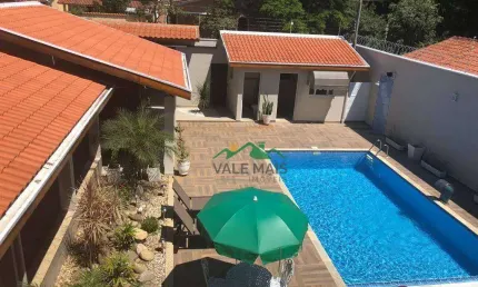 Casa com 3 dormitórios à venda, 300 m² por R$ 1.000.000,00 - Clube dos 500 - Guaratinguetá/SP