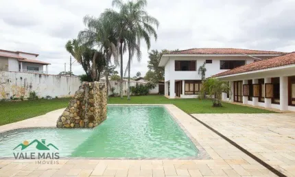 Casa com 5 dormitórios à venda, 600 m² por R$ 2.100.000,00 - Clube dos 500 - Guaratinguetá/SP