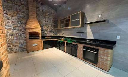 Casa com 3 dormitórios à venda, 175 m² por R$ 700.000 - Itaguacu - Aparecida/SP