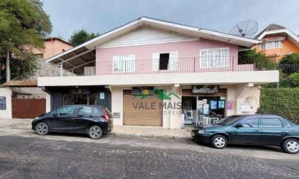 Casa com 3 dormitórios à venda, 361 m² por R$ 1.500.000,00 - Jaguaribe - Campos do Jordão/SP