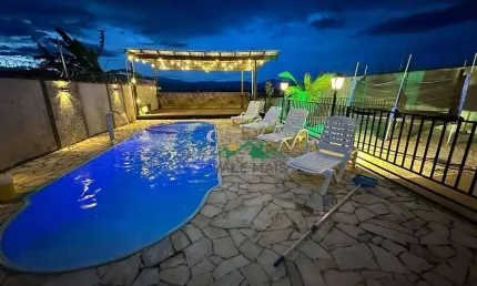 Casa com 3 dormitórios à venda, 194 m² por R$ 1.000.000,00 - Residencial Village Santana - Guaratinguetá/SP