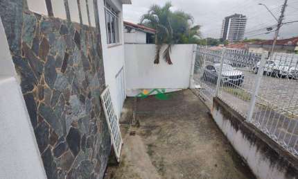 Casa com 4 dormitórios para alugar, 178 m² por R$ 3.176,70/mês - Vila Paraíba - Guaratinguetá/SP