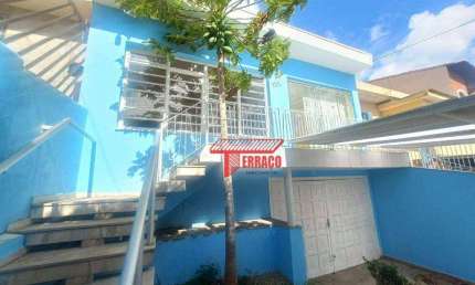 Casa com 3 dormitórios para alugar, 118 m² por R$ 3.886,00/mês - Vila Scarpelli - Santo André/SP