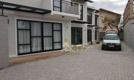 Sobrado 70 metros da praia em condomínio fechado à venda, 60 m² por R$ 750.000 - Centro - Penha/SC