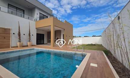 Casa com 4 dormitórios à venda, 439 m² por R$ 2.650.000,00 - Alphaville Jacuhy - Serra/ES