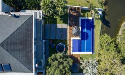 Casa de luxo no Terra Ville: 3 suítes, piscina e mais! Conheça essa oportunidade exclusiva em Belém Novo, Porto Alegre-RS!