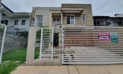 Casa com 3 quartos à venda na Rua Suécia, 221, Moinhos De Vento, Canoas por R$ 1.550.000
