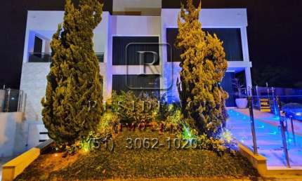 Casa com 4 quartos à venda na Rua das Caraúnas, 463, Jurerê Internacional, Florianópolis, 739 m2 por R$ 6.500.000