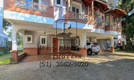 Casa em condomínio fechado com 3 quartos à venda na Rua General Rondon, 59, Tristeza, Porto Alegre, 295 m2 por R$ 2.674.000
