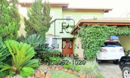 Casa em condomínio fechado com 4 quartos à venda na Avenida Juca Batista, 8000, Belém Novo, Porto Alegre, 386 m2 por R$ 2.700.000