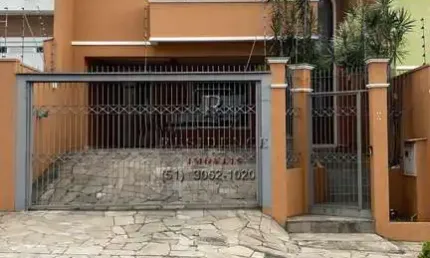 Casa com 3 quartos à venda na Rua Bélgica, 65, Marechal Rondon, Canoas, 300 m2 por R$ 1.300.000