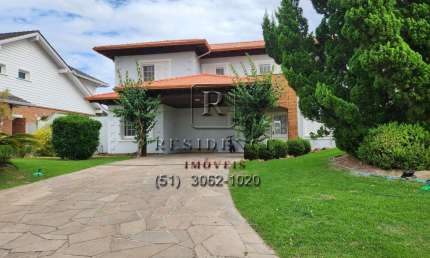 Casa em condomínio fechado com 4 quartos para alugar na Avenida Juca Batista, 8000, Belém Novo, Porto Alegre, 598 m2 por R$ 22.000