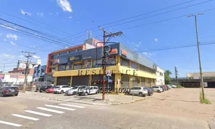 Locação de Prédio Comercial de Alta Visibilidade na Floresta, Porto Alegre-RS: 4 Banheiros, 1.839m² de Área e Estacionamento Amplo