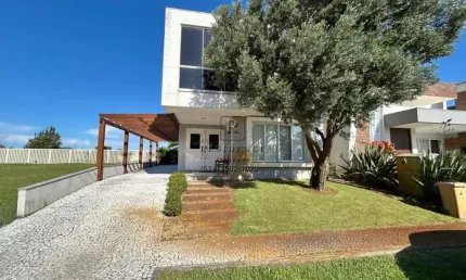 Casa de luxo em condomínio à venda em capão da canoa-rs, com 4 quartos, 4 suítes e 210m² de área. confira já!