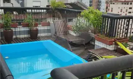 Triplex com 5 quartos à venda ou para locação em Embaré - SP